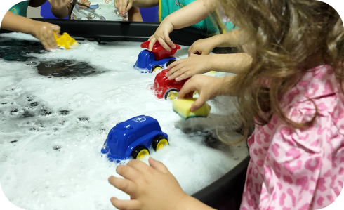 Two children playing together indoors